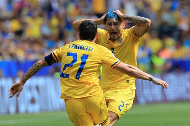 17th June 2024; Munich Football Arena, Munich, Germany; Euro 2024 Group E Football, Romania versus Ukraine; Nicolae Stanciu (rom) celebrates his goal for 1-0 in the 29th minute with Andrei Ratiu  ActionPlus12655750 PierrexTeyssot