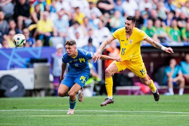 UEFA EURO 2024: Rumänien - Ukraine; 17.06.2024 Zweikampf Georgiy Sudakov (Ukraine, 14), Andonie Andrei Burca (Rumänien, 15) UEFA EURO 2024: Rumänien - Ukraine; Munich Football Arena, München am 17.06.2024 Copyright: xBEAUTIFULxSPORTS Wunderlx