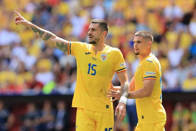 17th June 2024; Munich Football Arena, Munich, Germany; Euro 2024 Group E Football, Romania versus Ukraine; 15 Andrei Burca and Razvan Marin (rom) organise their tactics  ActionPlus12655761 PierrexTeyssot
