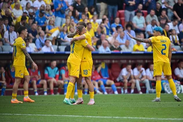 Bild zeigt: Torjubel Rumänien, Bancu (11, Rumänien), Dragus (19, Rumänien), 17.06.2024, München, Fussball, Europameisterschaft, Rumänien - Ukraine, EVENT REGULATIONS PROHIBIT ANY USE OF PHOTOGRAPHS AS IMAGE SEQUENCES AND OR QUASI-VIDEO.