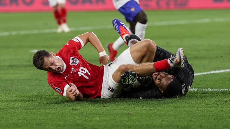 (240618) -- DUSSELDORF, June 18, 2024 -- Christoph Baumgartner (L) of Austria and Mike Maignan of France fall down after a clash during the UEFA EURO, EM, Europameisterschaft,Fussball 2024 Group D match between Austria and France in Dusseldorf, Germany, on June 17, 2024. ) (SP)GERMANY-DUSSELDORF-FOOTBALL-EURO 2024-AUSTRIA VS FRANCE PanxYulong 