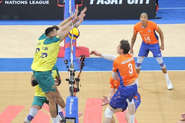 PH: Brazil Outlasts Netherlands in Four Sets during VNL 2024 Match Maarten Van Garderen 3, Orange of Netherlands tries to get the ball past two players of Brasil. Pasay City Metro Manila Philippines Copyright: DennisxJeromexAcosta
