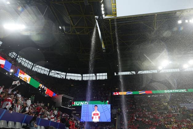 A general view as the rain pours down Turkiye v Georgia, UEFA European Championship, EM, Europameisterschaft 2024, Group F, Football, BVB Stadion, Dortmund, Germany, 18 Jun 2024 EDITORIAL USE ONLY No use with unauthorised audio, video, data, fixture lists, club league logos or live services. Online in-match use limited to 120 images, no video emulation. No use in betting, games or single club league player publications.  Copyright: xPaulxCurrie Shutterstockx 14543470v