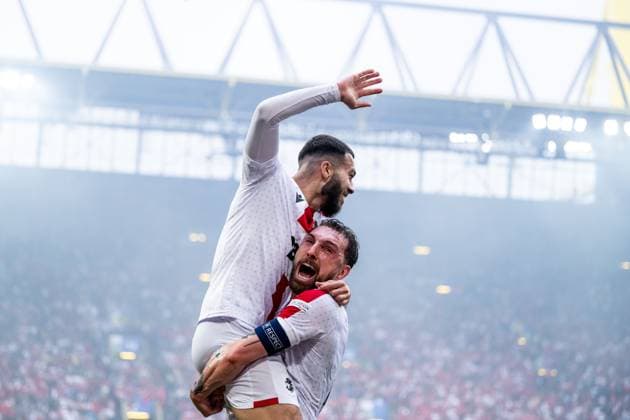 240618 Georges Mikautadze of Georgia celebrates with Guram Kashia after 1-1 during the UEFA EURO, EM, Europameisterschaft,Fussball 2024 Football Championship match between Türkiye and Georgia on June 18, 2024 in Dortmund. Photo: Jesper Zerman BILDBYRAN kod JZ JZ0541 fotboll football soccer fotball fotbolls-em europamästerskap em uefa euro uefa european football championship euro 2024 türkiye georgien georgia bbeng turkiet turkey jubel Copyright: JESPERxZERMAN BB240618JZ076