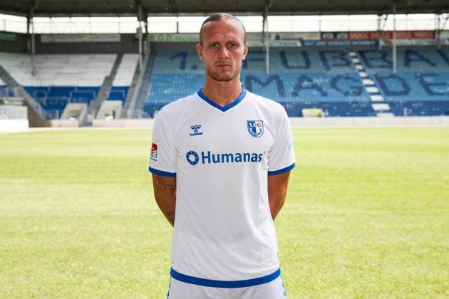 Torwart Dominik Reimann (1. FC Magdeburg,1) - 2. Fußball Bundesliga Saison 2024-2025 Fototermin 1. FC Magdeburg mit Neuzugänge und Mannschaft im neuen Heimtrikot in der AVNET Arena in Magdeburg - Fußball,Mann,Männer,Deutschland,18.06.2024