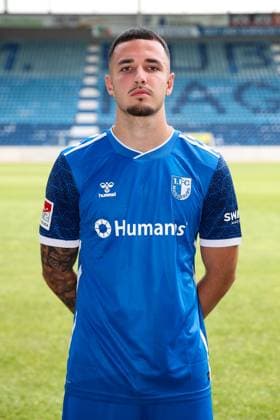 Falko Michel (1. FC Magdeburg,21) - 2. Fußball Bundesliga Saison 2024-2025 Fototermin 1. FC Magdeburg mit Neuzugänge und Mannschaft im neuen Heimtrikot in der AVNET Arena in Magdeburg - Fußball,Mann,Männer,Deutschland,18.06.2024