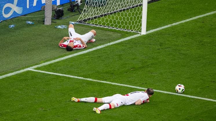 Football - UEFA EURO, EM, Europameisterschaft,Fussball 2024 - Group F - Turkey v Georgia DORTMUND, GERMANY - Tuesday, June 18, 2024: Georgia s Giorgi Kochorashvili (L) and Budu Zivzivadze collapse dejected after missing a chance during the UEFA Euro 2024 Group F match between Turkey and Georgia at the Westfalenstadion. (Photo by David Rawcliffe Propaganda) DORTMUND Westfalenstadion NORTH RHINE-WESTPHALIA GERMANY  Copyright: xDavidxRawcliffex P2024-06-18-Turkey_Georgia-98