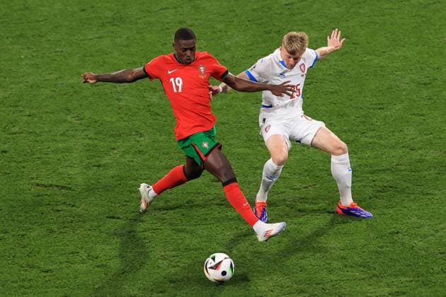 Football - UEFA EURO, EM, Europameisterschaft,Fussball 2024 - Group F - Portugal v Czech Republic 18th June 2024 - UEFA EURO 2024 - Group F - Portugal v Czech Republic - Nuno Mendes of Portugal and Pavel Sulc of Czech Republic - Photo: Simon Stacpoole Offside. Leipzig Germany Copyright: xSimonxStacpoolexOffside