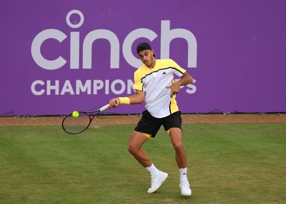18th June 2024; Cinch Championships, Queens Club, West Kensington, London, England: Cinch Championships Queens Club, Day 2; Francisco Cerundolo (ARG) serves to Carlos Alcaraz (ESP), mens singles match  ActionPlus12656674 JohnxPatrickxFletcher