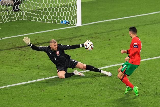 Football - UEFA EURO, EM, Europameisterschaft,Fussball 2024 - Group F - Portugal v Czech Republic 18th June 2024 - UEFA EURO 2024 - Group F - Portugal v Czech Republic - Czech Republic goalkeeper Jindrich Stanek saves a shot from Cristiano Ronaldo of Portugal - Photo: Simon Stacpoole Offside. Leipzig Germany Copyright: xSimonxStacpoolexOffside