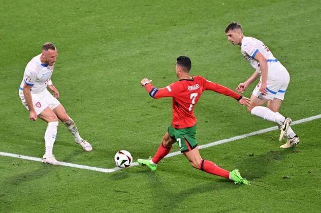 From left Czech Vladimir Coufal, Cristiano Ronaldo of Portugal and Czech Robin Hranac in action during the Czech Republic vs. Portugal match within the European Football Championships, Leipzig, Germany, June 18, 2024. (CTKxPhoto OndrejxHajek) CTKPhotoP2024061808745  CTKPhotoP2024061808745