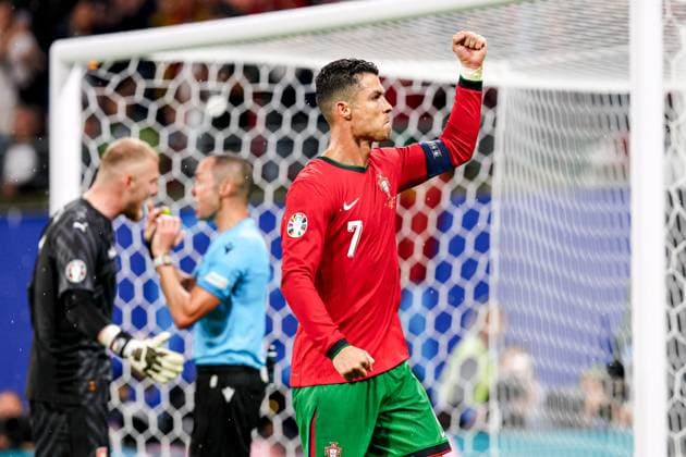 2024-06-18 Portugal v Czechia - Group F - UEFA EURO, EM, Europameisterschaft,Fussball 2024 LEIPZIG, GERMANY - JUNE 18: Cristiano Ronaldo of Portugal celebrates after Diogo Jota of Portugal scored teams second goal (cancelled by VAR), in the background Goalkeeper Jindrich Stanek of Czechia discussing with Referee Marco Guida over an offside goal during the Group F - UEFA EURO 2024 match between Portugal and Czechia at Red Bull Arena on June 18, 2024 in Leipzig, Germany. (Photo by Peter Lous BSR Agency) Leipzig Germany Content not available for redistribution in The Netherlands directly or indirectly through any third parties. Copyright: xBSRxAgencyx
