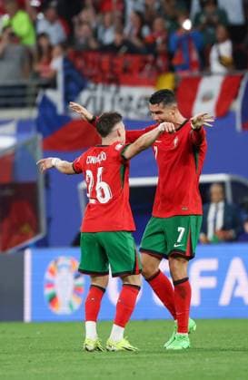 (240619) -- LEIPZIG, June 19, 2024 -- Cristiano Ronaldo (R) of Portugal celebrates with his teammate Francisco Conceicao during the UEFA EURO, EM, Europameisterschaft,Fussball 2024 Group F match between Portugal and the Czech Republic in Leipzig, Germany on June 18, 2024. ) (SP)GERMANY-LEIPZIG-FOOTBALL-EURO2024-PORTUGAL VS THE CZECH REPUBLIC BaixXuefei 