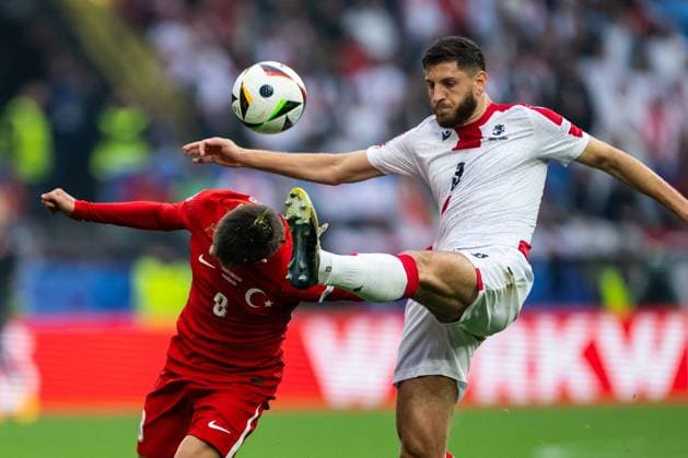 Turkiye v Georgia: Group F - UEFA EURO, EM, Europameisterschaft,Fussball 2024 Arda Gueler of Turkey is battling for possession with Lasha Dvali of Georgia (L-R) during the UEFA EURO 2024 group stage match between Turkiye and Georgia at Football Stadium Dortmund on June 18, 2024 in Dortmund, Germany. Dortmund Germany  Copyright: xHeshamxElsherifx originalFilename:elsherif-notitle240618_npjy5.jpg