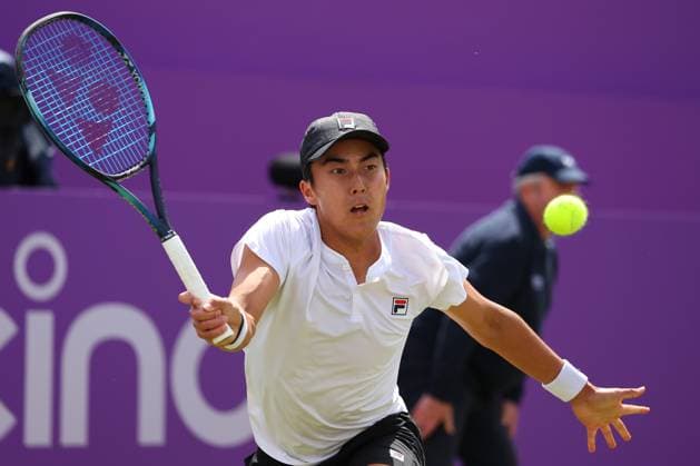 19th June 2024; Cinch Championships, Queens Club, West Kensington, London, England: Cinch Championships Queens Club, Day 3; Rinky Hijikata (AUS) with a forehand shot to Matteo Arnaldi (ITA), mens singles match  ActionPlus12656781 JohnxPatrickxFletcher