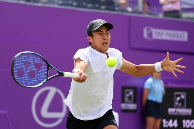 19th June 2024; Cinch Championships, Queens Club, West Kensington, London, England: Cinch Championships Queens Club, Day 3; Rinky Hijikata (AUS) with a forehand shot to Matteo Arnaldi (ITA), mens singles match  ActionPlus12656790 JohnxPatrickxFletcher