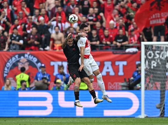 (240619) -- HAMBURG, June 19, 2024 -- Josip Sutalo (R) of Croatia vies for a header with Rei Manaj of Albania during the UEFA EURO, EM, Europameisterschaft,Fussball 2024 Group B match between Croatia and Albania in Hamburg, Germany on June 19, 2024. ) (SP)GERMANY-HAMBURG-FOOTBALL-EURO 2024-CROATIA VS ALBANIA RenxPengfei 