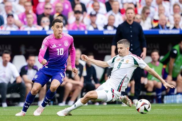 240619 Jamal Musiala of Germany and Adam Nagy of Hungary during the UEFA EURO, EM, Europameisterschaft,Fussball 2024 Football Championship match between Germany and Hungary on June 19, 2024 in Stuttgart. Photo: Jesper Zerman BILDBYRAN kod JZ JZ0542 fotboll football soccer fotball fotbolls-em europamästerskap em uefa euro uefa european football championship euro 2024 tyskland germany hungary bbeng Copyright: JESPERxZERMAN BB240619JZ039