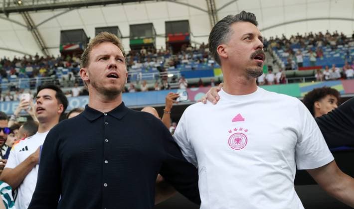 Trainer Julian Nagelsmann und Co Trainer Sandro Wagner singen Hymne Fußball Fussball Europameisterschaft Euro 2024 EM Herren Saison 2023 2024 19.06.2024 Deutschland GER vs. Ungarn HUN in Stuttgart DFL regulations prohibit any use of photographs as image sequences and or quasi-video.