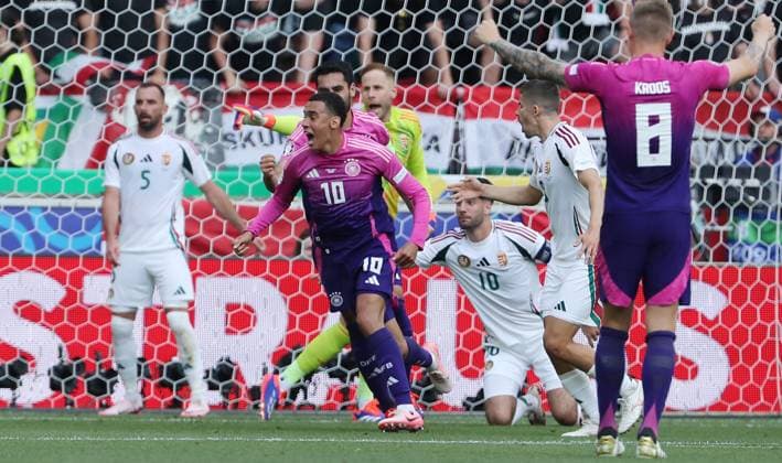 Jamal Musiala jubelt nach 1:0 Freude Emotion Jubel Fußball Fussball Europameisterschaft Euro 2024 EM Herren Saison 2023 2024 19.06.2024 Deutschland GER vs. Ungarn HUN in Stuttgart DFL regulations prohibit any use of photographs as image sequences and or quasi-video.