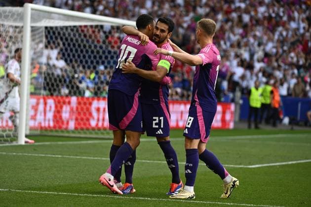 19.06.2024, xpsx, Fussball EM 2024, Deutschland - Ungarn emspor, v.l. Torjubel nach dem Tor zum celebrating the goal celebrate 1:0 durch Jamal Musiala (Deutsche Fussball Nationalmannschaft DFB) Ilkay Gündogan (Deutsche Fussball Nationalmannschaft DFB) Maximilian Mittelstädt (Deutsche Fussball Nationalmannschaft DFB) (DFL DFB REGULATIONS PROHIBIT ANY USE OF PHOTOGRAPHS as IMAGE SEQUENCES and or QUASI-VIDEO) Stuttgart