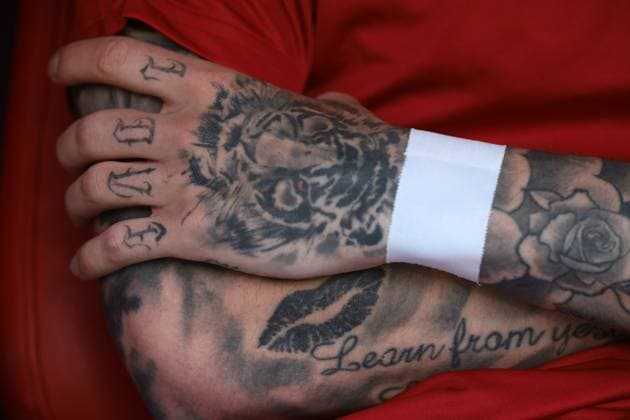 Cologne, Germany, 15th June 2024. Tattoos on the arms of Hungary substitutes prior to the UEFA European Championships match at Cologne Stadium, Cologne. Picture credit should read: Jonathan Moscrop Sportimage EDITORIAL USE ONLY. No use with unauthorised audio, video, data, fixture lists, club league logos or live services. Online in-match use limited to 120 images, no video emulation. No use in betting, games or single club league player publications. SPI-3181-0072