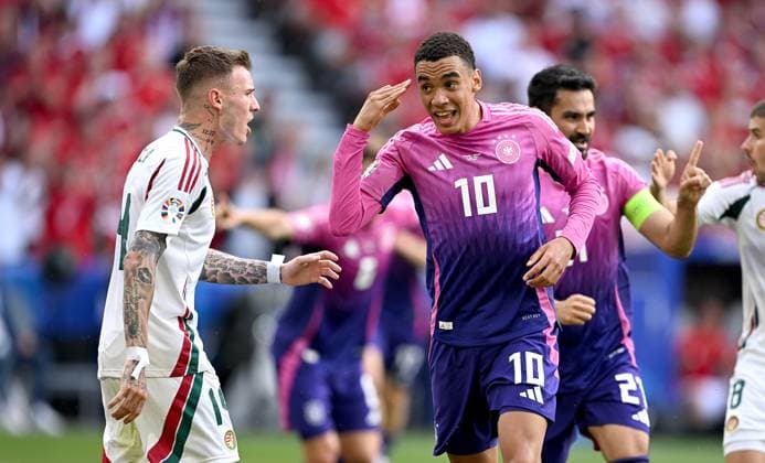 Fussball Euro 2024 Gruppe A 19.06.2024 Deutschland - Ungarn Jubel Deutschland; nach dem Tor zum 1-0 durch den Torschuetzen Jamal Musiala (re) Enttaeuschung bei Bendeguz Bolla (li., Ungarn)