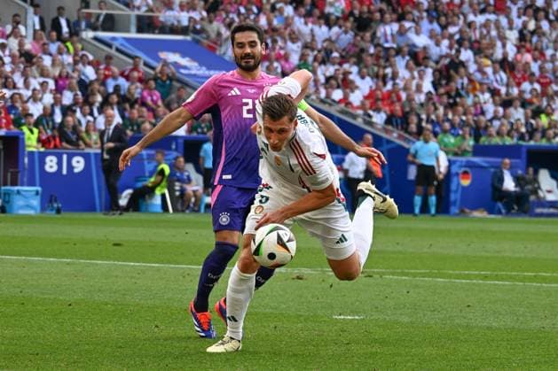 19.06.2024, xsltx, Fussball EM 2024, Deutschland - Ungarn emspor, v.l. Ilkay Guendogan (Gündogan, Deutschland, 21), Willi Orban (Ungarn, 6) Zweikampf, Duell, Kampf, tackle (DFL DFB REGULATIONS PROHIBIT ANY USE OF PHOTOGRAPHS as IMAGE SEQUENCES and or QUASI-VIDEO) Stuttgart