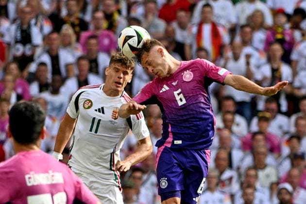 19.06.2024, xpsx, Fussball EM 2024, Deutschland - Ungarn emspor, v.l. Milos Kerkez (Ungarn) Joshua Kimmich (Deutsche Fussball Nationalmannschaft DFB) Zweikampf, Aktion, action, battle for the ball (DFL DFB REGULATIONS PROHIBIT ANY USE OF PHOTOGRAPHS as IMAGE SEQUENCES and or QUASI-VIDEO) Stuttgart
