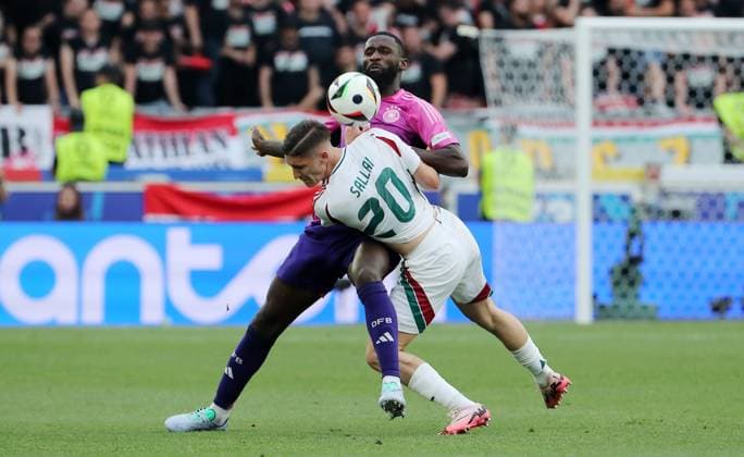 Antonio Rüdiger im Zweikampf mit Roland Sallai Fußball Fussball Europameisterschaft Euro 2024 EM Herren Saison 2023 2024 19.06.2024 Deutschland GER vs. Ungarn HUN in Stuttgart DFL regulations prohibit any use of photographs as image sequences and or quasi-video.