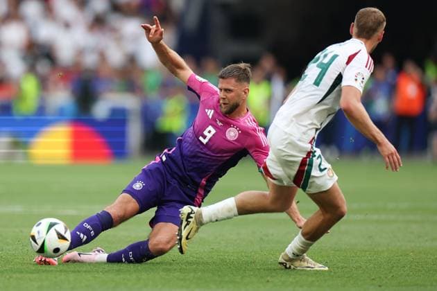 Stuttgart, Arena Stuttgart Wednesday, June 19, 2024 UEFA EURO, EM, Europameisterschaft,Fussball 2024 Germany, Group A stage Matchday 2 Group A Germany - Hungary, Niclas Fuellkrug (Germany), Marton Dardai (Hungary), Zweikampf, Action, Aktion, Battles for the Ball Copyright: JoaquimxFerreira