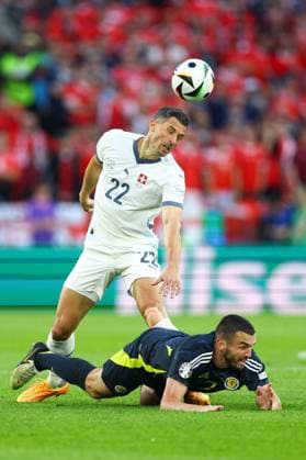 John McGinn of Scotland is challenged by Fabian Schär of Switzerland Scotland v Switzerland, UEFA European Championship, EM, Europameisterschaft 2024, Group A, Football, Cologne Stadium, Cologne, Germany, 19 Jun 2024 EDITORIAL USE ONLY No use with unauthorised audio, video, data, fixture lists, club league logos or live services. Online in-match use limited to 120 images, no video emulation. No use in betting, games or single club league player publications. Copyright: xKieranxMcManus Shutterstockx 14543653ar