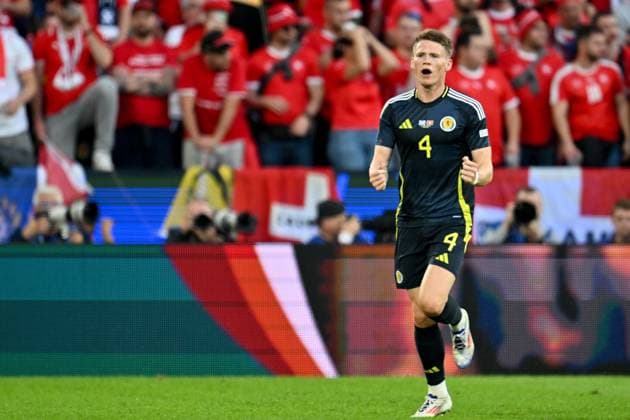 240619 EURO2024 SCOTLAND VS SWITZERLAND Scott McTominay (4) of Scotland celebrates after scoring the 1-0 goal during a soccer game between the national teams of Scotland and Switzerland on the 2nd matchday in Group A in the group stage of the UEFA EURO, EM, Europameisterschaft,Fussball 2024 tournament , on Wednesday 19 June 2024 in Cologne , Germany . PHOTO SPORTPIX David Catry Cologne GERMANY  Copyright: xx 465064