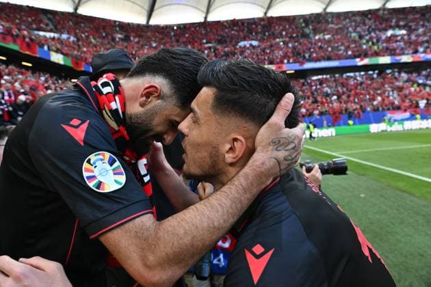 HAMBURG, GERMANY - JUNE 19: Elseid Hysaj of Albania celebrate with Mirlind Daku after the UEFA EURO, EM, Europameisterschaft,Fussball 2024 group stage match between Croatia and Albania at Volksparkstadion on June 19, 2024 in Hamburg, Croatia v Albania: Group B - UEFA EURO 2024 Copyright: xSebastianxFrejx