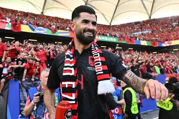 HAMBURG, GERMANY - JUNE 19: Elseid Hysaj of Albania with megaphone celebrates after the UEFA EURO, EM, Europameisterschaft,Fussball 2024 group stage match between Croatia and Albania at Volksparkstadion on June 19, 2024 in Hamburg, Croatia v Albania: Group B - UEFA EURO 2024 Copyright: xSebastianxFrejx