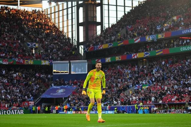 GER: Scotland v Switzerland. UEFA EURO, EM, Europameisterschaft,Fussball 2024 Angus Gunn of Scotland celebrates the opening goal during the UEFA Euro 2024 match between Scotland and Switzerland, Group A, date 2, played at Rhein Energie Stadium on June 19, 2024 in Koln, Germany. kpng Copyright: xSergioxRuizx xPRESSINPHOTOx PS_240619_SCO_SWI_1080