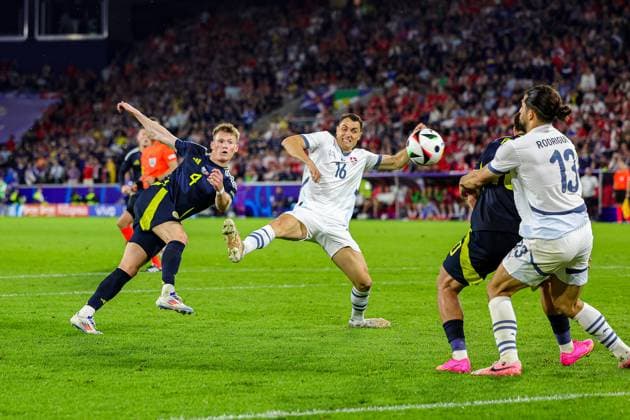 Scotland v Switzerland Euro 2024 19 06 2024. Group A Scotland midfielder Scott McTominay shoots towards the goal during the Euro 2024 match between Scotland and Switzerland at Rhein Energie Stadion, Cologne, Germany on 19 June 2024. Editorial use only , Copyright: xNigelxKeenex PSI-19821-0042