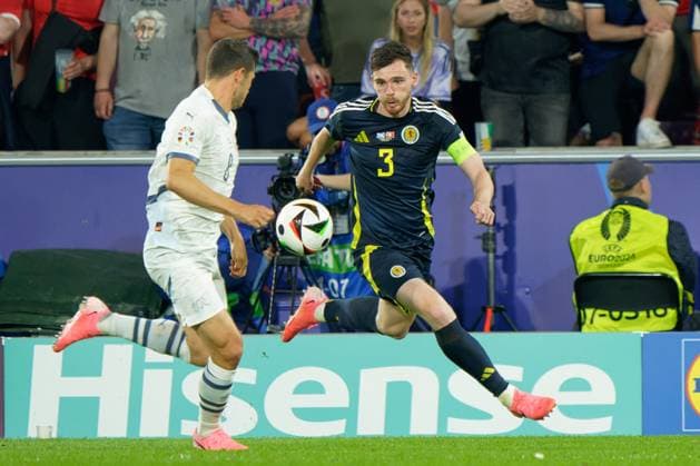 Andrew Robertson of Scotland and Remo Freuler of Swiss during UEFA EURO, EM, Europameisterschaft,Fussball 2024 - Scotland vs Switzerland, UEFA European Football Championship in Colony, Germany, June 19 2024  Copyright: xEmmanuelexMastrodonato IPAxSportx xx IPA_47288328 IPA_Agency_IPA47288328