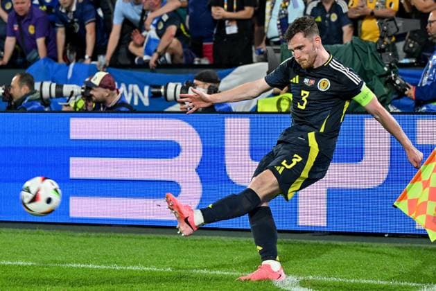 240619 EURO2024 SCOTLAND VS SWITZERLAND Andrew Robertson (3) of Scotland pictured in action during a soccer game between the national teams of Scotland and Switzerland on the 2nd matchday in Group A in the group stage of the UEFA EURO, EM, Europameisterschaft,Fussball 2024 tournament , on Wednesday 19 June 2024 in Cologne , Germany . PHOTO SPORTPIX David Catry Cologne GERMANY  Copyright: xx 465209