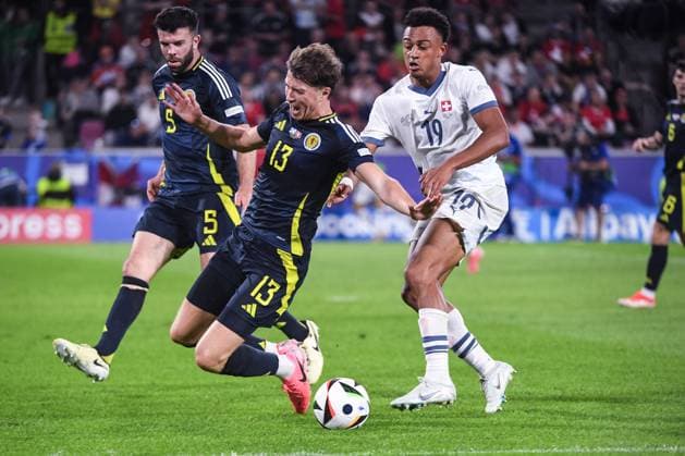 COLOGNE, GERMANY - JUNE 19: Dan Ndoye of Switzerland (R) against Jack Hendry of Scotland (L) during the UEFA EURO, EM, Europameisterschaft,Fussball 2024 group stage match between Scotland and Switzerland at Cologne Stadium on June 19, 2024 in Cologne, Germany. Cologne Cologne Stadium North Rhine-Westphalia Germany Copyright: xJustPictures.ch ManuelxWinterbergerx jp-en-EuSpIm-JP4_MAN_Scotland_Swiss_19Jun2024_CO_00035