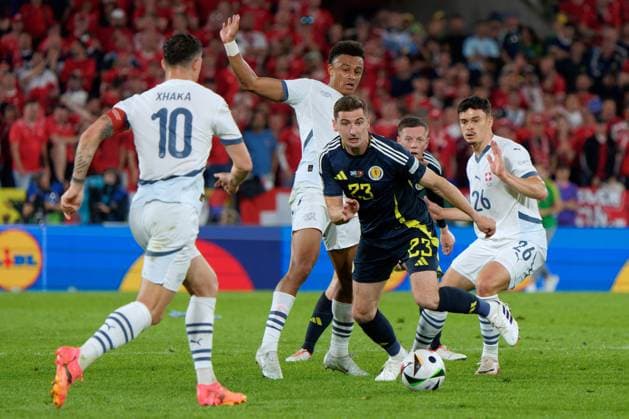 UEFA European Football Championship - UEFA EURO, EM, Europameisterschaft,Fussball 2024 - Scotland vs Switzerland Kenny McLean of Scotland in action against Ruben Vargas of Swiss and Fabian Rieder of Swiss during UEFA Euro 2024 - Scotland vs Switzerland, UEFA European Football Championship in Colony, Germany, June 19 2024 Colony Germany  Copyright: xIPAxSport ABACAx