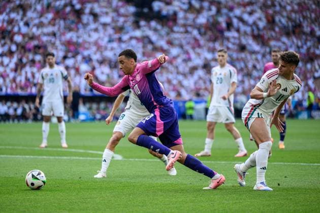 240619 Jamal Musiala of Germany and Milos Kerkez of Hungary during the UEFA EURO, EM, Europameisterschaft,Fussball 2024 Football Championship match between Germany and Hungary on June 19, 2024 in Stuttgart. Photo: Jesper Zerman BILDBYRAN kod JZ JZ0542 fotboll football soccer fotball fotbolls-em europamästerskap em uefa euro uefa european football championship euro 2024 tyskland germany hungary bbeng Copyright: JESPERxZERMAN BB240619JZ225