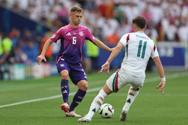 Joshua Kimmich (Germany)Milos Kerkez (Hungary) during the UEFA EURO, EM, Europameisterschaft,Fussball Germany 2024 match between Germany 2-0 Hungary at Stuttgart Arena on June 19, 2024 in Stuttgart, Germany. Noxthirdxpartyxsales  (256971105)