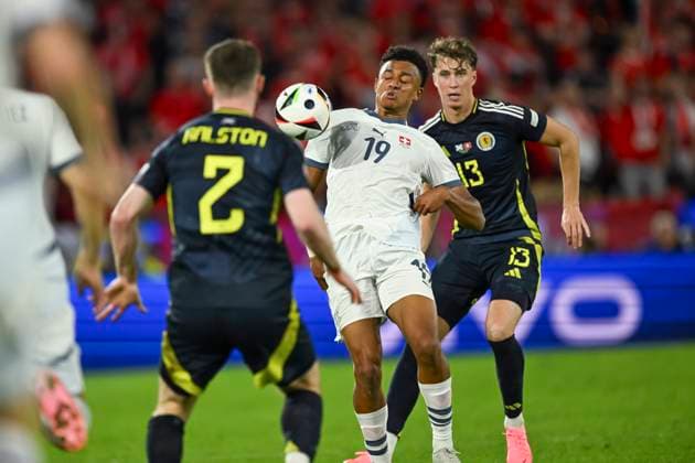 Dan Ndoye (Switzerland)Jack Hendry (Scotland) during the UEFA EURO, EM, Europameisterschaft,Fussball Germany 2024 match between Switzerland 1-1 Scotland at Cologne Stadium on June 19, 2024 in Cologne, Germany. Noxthirdxpartyxsales  (256971235)