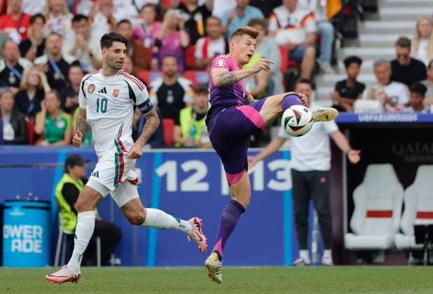 (240620) -- STUTTGART, June 20, 2024 -- Toni Kroos (R) of Germany vies with Dominik Szoboszlai of Hungary during the UEFA EURO, EM, Europameisterschaft,Fussball 2024 Group A match between Germany and Hungary in Stuttgart, Germany on June 19, 2024. (Photo by Xinhua) (SP)GERMANY-STUTTGART-FOOTBALL-EURO 2024-GERMANY VS HUNGARY PhilippexRuiz 
