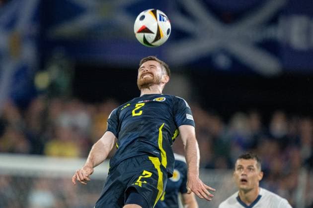 GER, EURO 2024, Group A, Schottland (SCT) vs Schweiz (SUI) 19.06.2024, Cologne Stadium, Koeln, GER, EURO 2024, Group A, Schottland (SCT) vs Schweiz (SUI) Im Bild: Anthony Ralston (Schottland SCT, 02); Kopfball Kopfballduell; Dynamik, Aktion, Action, Spielszene; Gestik, Mimik, Emotionen;