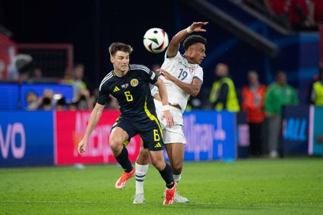 Kieran TIERNEY (SCO) gegen NDOYE Dan (SUI) Aktion, Zweikampf, Gruppenphase Gruppe A Schottland (SCO) - Schweiz (SUI) 1:1 am 19.06.2024 Stadion Koeln, Cologne Stadium, Fussball UEFA EURO, EM, Europameisterschaft,Fussball 2024 GERMANY vom 14.06.2024 - 14.07.2024. Â