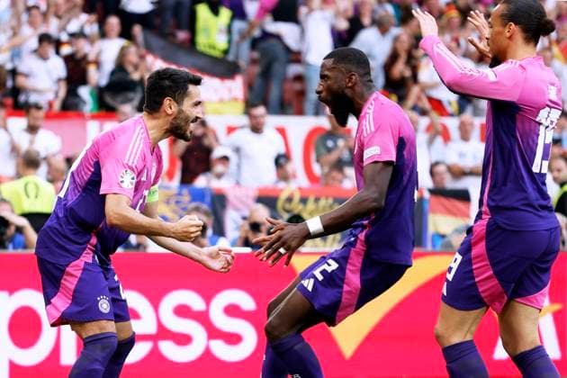 GUENDOGAN Ilkay Kapitaen Team Deutschland jubelt nach seinem Tor zum 2 : 0 Endstand mit RUEDIGER Antonio und SANE Leroy UEFA Fussball Europameisterschaften 2024 in Deutschland Spiel Deutschland - Ungarn 2 : 0 am 19.06. 2024 in Stuttgart DFL REGULATIONS PROHIBIT ANY USE OF PHOTOGRAPHS as IMAGE SEQUENCES and or QUASI-VIDEO Copyright: xLacixPerenyix