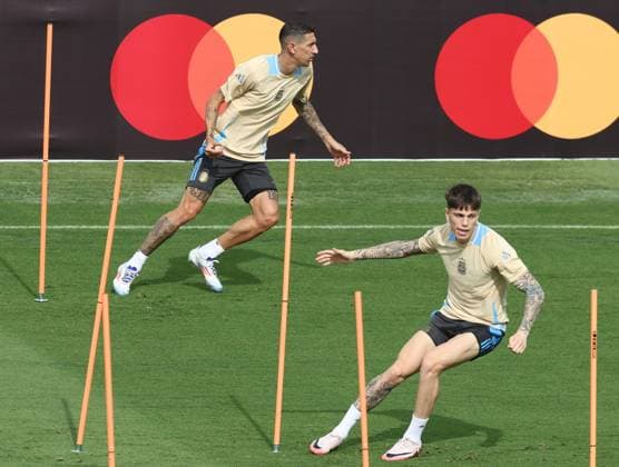 Argentina s forward Angel Di Maria (L) and forward Alejandro Garcnacho take part in a training session ahead the match against Canada for the Copa America USA 2024, group A, groupe stage, at Kennesaw University Sports Field, near Atlanta city, on June 19, 2024. KENNESAW UNITED STATES Copyright: xALEJANDROxPAGNIx