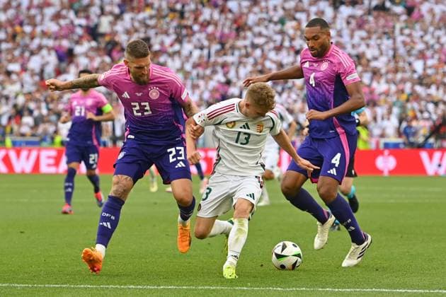 v.li:Robert Andrich (GER), Andras SCHAEFER (HUN), Jonathan Tah (GER), Aktion,Zweikampf. Gruppenphase Gruppe A Deutschland (GER) - Ungarn (HUN) 2-0 am 19.06.2024, Stuttgart Arena. Fussball UEFA EURO, EM, Europameisterschaft,Fussball 2024 GERMANY vom 14.06.2024 - 14.07.2024.